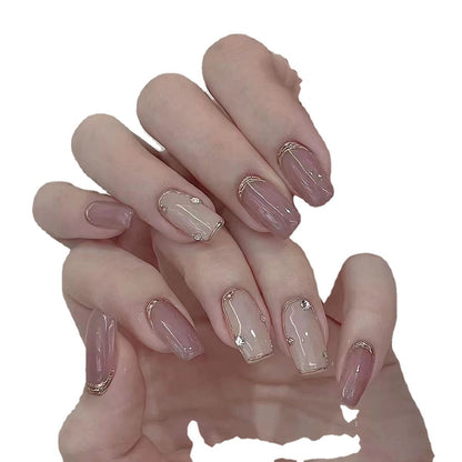 Manicure with nude metal mirror lines on hands